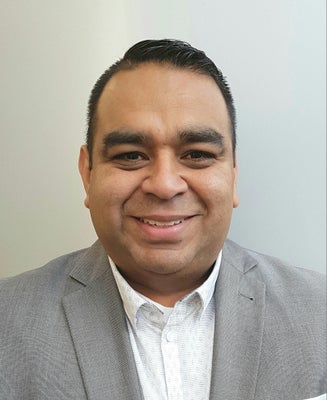 Portrait of Edson Cruz, Associate.